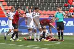 3.Liga - Saison 2022/2023 - FC Ingolstadt 04 -  - SV Waldhof-Mannheim - Dominik Franke (Nr.3 - FCI) verletzt am Boden - Tobias Bech (Nr.11 - FCI) - Foto: Meyer Jürgen