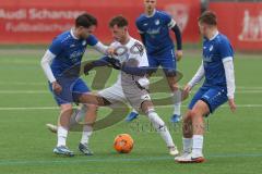 AUDI - Schanzer Amateur Cup - Halbfinale 1 - Saison 2024/25 - FC Mindelstetten - SV Menning - Moritz Liedl weiss Mindelstetten - Noah Kamenjasevic blau Menning links - Florian Reszler blau Menning rechts - Foto: Meyer Jürgen