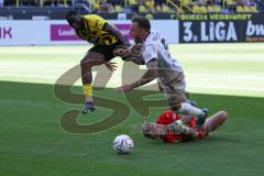 3. Fußball-Liga - Saison 2022/2023 - Borussia Dortmund II - FC Ingolstadt 04 - Patrick Schmidt (Nr.9 - FCI) wird durch Torwart Unbehaun Luca (Nr.38 - Borussia Dortmund II) gefoult und es gibt Elfmeter - Foto: Meyer Jürgen