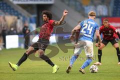 3. Liga - Hansa Rostock - FC Ingolstadt 04 - Jan Löhmannsröben (24 Rostock) nimmt Francisco Da Silva Caiuby (13, FCI) den Ball weg