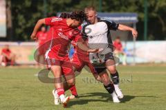Testspiel - Bezirksliga - Saison 2025/26 - TSV Ober./Unterhaunstadt - Türkisch Ingolstadt  - Baha Asici rot Türkisch  - Florian Diegel weiss Ober./Unterh.stadt - Daniel Drotleff rot #8 Türkisch - Foto: Meyer Jürgen
