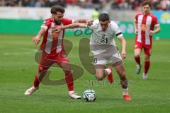 3. Liga - Saison 2023/24 - Rot-Weiss Essen - FC Ingolstadt 04 -  - Jose Enrique Rios Alonso (#23 Essen) - Draculic Ognjen (Nr.30 - FCI) - Foto: Meyer Jürgen