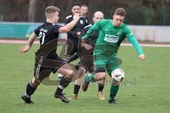 Kreisliga - Saison 2022/2023 - DJK Ingolstadt - SV Manching U23 - Elias Bauer grün Manching - Christoph Handl schwarz DJK Ing. - Foto: Meyer Jürgen