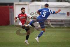 Kreisliga - Saison 2026/27- Türkisch SV Ingolstadt - SV Hundszell - Hakan Düzkün rot Türkisch  - Tim Liesegang blau Hundszell - Foto: Meyer Jürgen