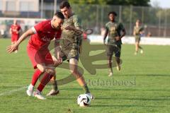 Toto - Pokal - Saison 2024/25 - TSV Lohr - FC Ingolstadt 04 - Ognjen Drakulic (Nr.30 - FCI) - Florian Copacian (Nr.13 - TSV Lohr) - Foto: Meyer Jürgen