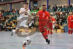 Lotto - Hallen - Bayerncup - Oberbayern -  Saison 2022/2023  - FC Fatih - Traunstein - 1:1 - Deniz Sari rot Fatih - Gentian Vokri weiss Traunstein - Foto: Meyer Jürgen