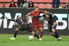 3. Liga; FC Ingolstadt 04 - Rot-Weiss Essen; Zweikampf Kampf um den Ball #Yann Sturm (7, FCI) Safi Ramien (7 RWE) Rios Alonso José-Enrique (23 RWE)