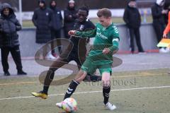 Freundschaftsspiel - FC Fatih Ingolstadt - TV Aiglsbach - Boubacarr Saho schwarz FC Fatih - Fabian Rasch grün Aiglsbach - Foto: Meyer Jürgen