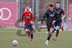 Bayernliga Süd - Saison 2021/2022 - FC Ingolstadt 04 II -  SpVgg Unterhaching - Arian Llugiqi #9 FCI rechts - Christoph Ehlich rot #33 Haching - Foto: Meyer Jürgen