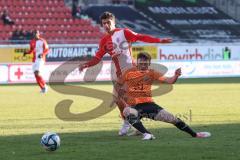 2024_1_20 - 3. Liga - Saison 2023/24 - HallescherFC - FC Ingolstadt 04 -  - Tunay Deniz (Nr.20 - HallescherFC ) - Moritz Seiffert (Nr.23 - FC Ingolstadt 04) - Foto: Meyer Jürgen