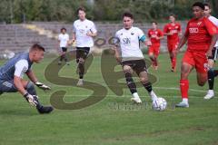 Bayernliga Nord - Saison 2023/2024 - FC Ingolstadt 04 - FC Coburg - David Udogu rot FCI - Luis Krempel Torwart Coburg - Foto: Meyer Jürgen