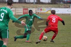 Testspiel - SV Manching - TSV Pöttmes - Ousseynou Tamba (#10 Manching) - Maximilian Ettner rot Pöttmes - Foto: Jürgen Meyer