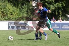 Kreisklasse - Saison 2025/26- SV Haunwöhr - FC Geisenfeld  - Tim Schirmer blau Haunwöhr - Lukas Kellermann grün Geisenfeld - Foto: Meyer Jürgen