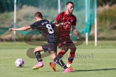 Kreisklasse - Saison 2023/2024 -SV Zuchering - SV Oberstimm - Julian Weidinger schwarz Oberstimm - Lukas Högele rot Zuchering - Foto: Meyer Jürgen