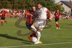 Toto Pokal - Saison 2022/2023 - SpVgg Heßdorf - FC Ingolstadt 04 - Pascal Testroet (Nr.37 - FCI) - Nick Ackermann (Nr.23 - SpVgg Hessdorf) - Foto: Meyer Jürgen