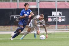 3. Liga; Testspiel; FC Ingolstadt 04 - TSV Rain/Lech, Zweikampf Kampf um den Ball Patrick Schmidt (9, FCI) Stefan Müller (RL)