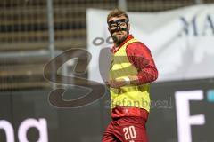3. Liga; FC Viktoria Köln - FC Ingolstadt 04; vor dem Spiel Yannick Deichmann (20, FCI) mit Gesichtsmaske Verletzung