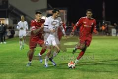 Toto-Pokal; 
Türkgücü München - FC Ingolstadt 04; Zweikampf Kampf um den Ball Arian Llugiqi (25, FCI) Ezeala, Ikenna (33 TGM) Velagic, Azur (55 TGM)