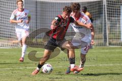 *** A-Junioren Bundesliga  - Saison 2025/26 - A-Junioren - FC Ingolstadt 04 - 1. FC Nürnberg - Hoffmann Tim rot FCI - Gerner Lucas weiss Nürnberg - Foto: Meyer Jürgen