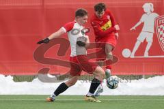 Schanzer Amateurcup 2026 - TSV Kösching - TSV Wolnzach-  - Elias Kraus rot Kösching - Simon Stippel weiss Wolnzach - Foto: Meyer Jürgen