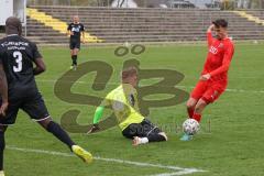 Bayernliga Süd - Saison 2021/2022 - FC Ingolstadt 04 II - TürkAugsburg - Arian Llugiqi mit einer Torchance - Leon Musial Torwart Augsburg  - Foto: Meyer Jürgen