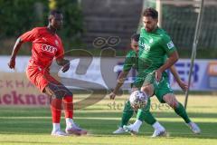 Freundschaftsspiel - Saison 2023/2024 - SV Manching - FC Ingolstadt 04 - Mussa Fonanah (Nr.7 - FCI U21) - Ralf Schröder (Nr.21 - SV Manching) - Abou-Khalil Abdel (Nr.20 - SV Manching) -  - Foto: Meyer Jürgen