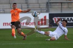 3.Liga - Saison 2023/2024 - SC Freiburg II - FC Ingolstadt 04 - Mladen Cvjetinovic (Nr.19 - FCI) - Lukas Ambros (Nr.36 - Freiburg II) - Foto: Meyer Jürgen