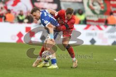 3. Liga - Saison 2025/26 - FC Ingolstadt 04 - Energie Cottbus - Simon Lorenz (Nr.32 - FCI) - Lukas Michelbrink (Nr.8 - FC Energie Cottbus) - Foto: Meyer Jürgen