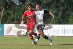 Testspiel - Bezirksliga - Saison 2025/26 - TSV Ober./Unterhaunstadt - Türkisch Ingolstadt  - Baha Asici rot Türkisch  - Florian Diegel weiss Ober./Unterh.stadt - Foto: Meyer Jürgen