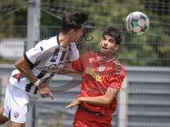 Bayernliga Nord - Saison 2026/27 - FC Ingolstadt 04 II - Jahn Regensburg II - Vitus Zimmermann rot Regensburg - Ioannis Petkos (Nr.18 - FCI II) - Foto: Meyer Jürgen