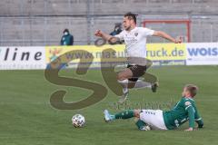 3. Liga - VfB Lübeck - FC Ingolstadt 04 - Michael Heinloth (17, FCI) Hertner Sebastian (3 Lübeck)