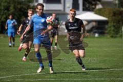 Kreisliga - Saison 2026/27 - SV Hundszell - SV Menning - Lukas Conradi blau Hundszell - Moritz Faigle schwarz Menning  - Foto: Meyer Jürgen
