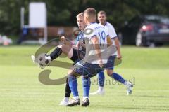 Kreisliga - Saison 2023/2024 - SV Menning - FC Mindelstetten - Marcel von Schuttenbach blau Menning - Jonas Greth weiss Mindelstetten - Foto: Meyer Jürgen