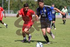 Testspiel - Bezirksliga - Saison 2025/26 - FC Fatih Ingolstadt - TSV Burgheim - Aaron Toski rot Fatih - Nick Vogel blau Burgheim  - Foto: Meyer Jürgen