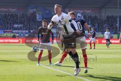 2.BL; Holstein Kiel - FC Ingolstadt 04 - Zweikampf Kampf um den Ball Stefan Kutschke (30, FCI) Holtby Lewis (10 Kiel)