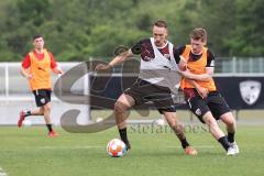 3. Liga; FC Ingolstadt 04 - Trainingsauftakt, Zweikampf Kampf um den Ball Tobias Schröck (21, FCI) Denis Linsmayer (23, FCI)