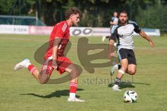 Testspiel - Bezirksliga - Saison 2025/26 - TSV Ober./Unterhaunstadt - Türkisch Ingolstadt  - Enis Kuqanaj rot Türkisch  - Firat Acar weiss Ober./Unterh.stadt - Foto: Meyer Jürgen