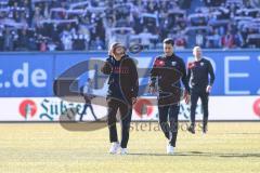 3. Liga; FC Hansa Rostock - FC Ingolstadt 04; vor dem Spiel Cheftrainerin Sabrina Wittmann (FCI) Co-Trainer Ilia Gurev (FCI) Torwart-Trainer Robert Wulnikowski (FCI)