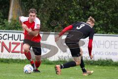 A-Klasse - Saison 2022/2023 - TSV Unsernherrn - TV 1911 Vohburg - Florian Hauber rot Vohburg - Lukas Schwarzbauer schwarz Unsernherrn - Foto: Meyer Jürgen