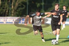 Bezirksliga - Saison 2025/26 - TSV Ober./Unterhaunstadt - VFR Garching - Baris Soysal (Nr.22 - TSV Ober-/Unterh.stadt) - Oliver Stefanovic schwarz Garching - Foto: Meyer Jürgen