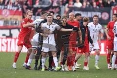 3. Liga; Rot-Weiss Essen - FC Ingolstadt 04; Foul Felix Keidel (43, FCI) Mizuta Kaito (24 RWE) Cheftrainerin Sabrina Wittmann (FCI) hält Felix Keidel (43, FCI) zurück