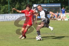 Testspiel - Bezirksliga - Saison 2025/26 - TSV Ober./Unterhaunstadt - Türkisch Ingolstadt  - Baha Asici rot Türkisch  - Florian Diegel weiss Ober./Unterh.stadt - Foto: Meyer Jürgen