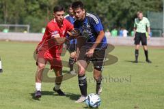 Testspiel - Bezirksliga - Saison 2025/26 - FC Fatih Ingolstadt - TSV Burgheim - Aaron Toski rot Fatih - Nick Vogel blau Burgheim  - Foto: Meyer Jürgen