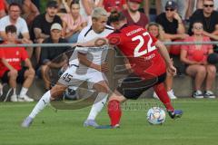 Toto Pokal - Saison 2022/2023 - SpVgg Heßdorf - FC Ingolstadt 04 - Thomas Rausch (Nr.45 - FCI) - Maximilian Kundt (Nr.22 - SpVgg Hessdorf) - Foto: Meyer Jürgen