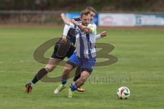 Kreisliga - Saison 2025/26- SV Karlshuld - SV Menning - Daniel Mayer weiss Karlskron  - Philip Wolfsfellner schwarz Menning  - Foto: Meyer Jürgen