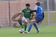 2024_2_17 - Saison 2023/24 - AUDI-Schanzer Amateur Cup - SV Hundszell - FC Gerolfing - Finale - Altan Calim grün Gerolfing - Maximilian Naber blau Hundszell - Foto: Meyer Jürgen