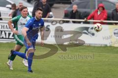 Kreisklasse - Saison 2024/25- TSV Großmehring - FC Geisenfeld - Sebastian Eisenberger blau Großmehring  - Simon Feulner grün Geisenfeld - Foto: Meyer Jürgen