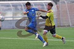 2024_2_17 - Saison 2023/24 - AUDI-Schanzer Amateur Cup - SV Hundszell - FC Hitzhofen/Oberzell  - Halbfinale 1 - Dominic Filser gelb Hitzhofen - Luca Kammerer
 blau Hundszell - Foto: Meyer Jürgen