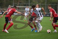 Saison 2026/27 - Freundschaftsspiel - 1. FC Nürnberg - FC Ingolstadt 04 - Dennis Kaygin (Nr.10 - FCI) - Ioannis Masouras (Nr.21 - FCN) - Rafael Lubach (Nr.18 - FCN) - Foto: Meyer Jürgen