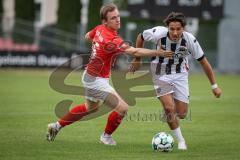 Bayernliga Nord - Saison 2026/27 - FC Ingolstadt 04 II - ASV Cham - Can Paylan (Nr.6 - FCI II) - Lukas Leutner rot Cham - Foto: Meyer Jürgen